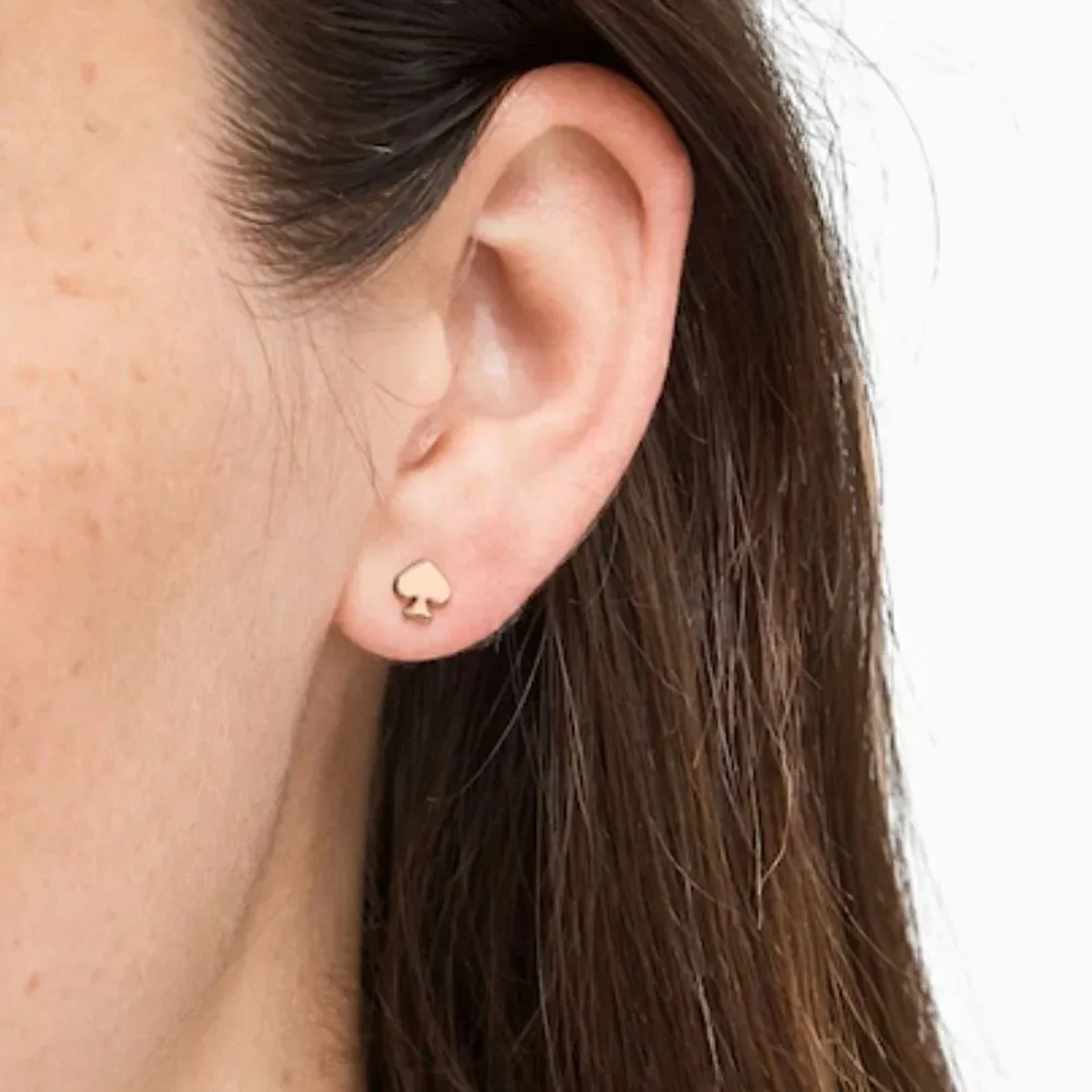 NWT Kate Spade mini studs signature rosegold​